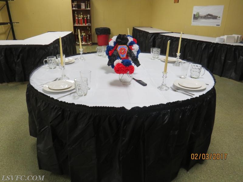 Memorial table for our 5 fallen members John Spiker Sr, J.D. Schlotterbeck, Charles Holmes, Dolores Brown, and Gabe Schultz